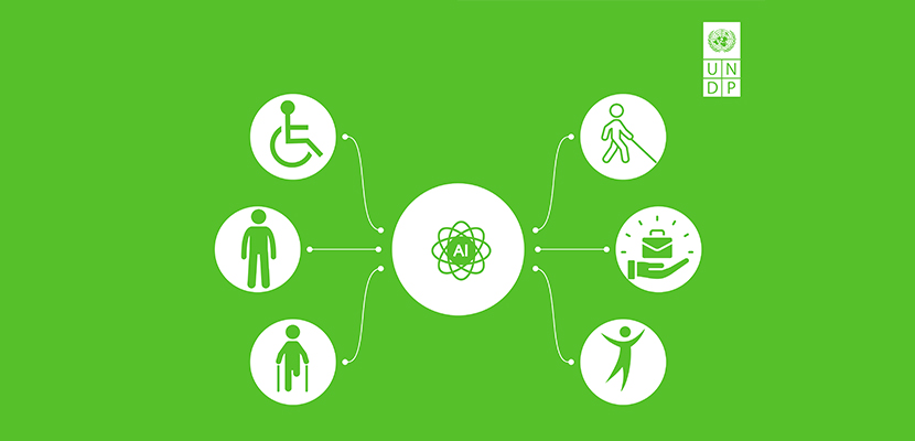 Betimleme: Görsel, yapay zekânın kapsayıcı kalkınmadaki rolünü simgesel bir şekilde anlatıyor. Yeşil arka plan üzerinde ortada "AI" yazılı atom benzeri bir ikon yer alıyor. Bu ikonun etrafında, farklı insan çeşitliliklerini temsil eden altı sembol bulunuyor: tekerlekli sandalye kullanan birey, ayakta duran kişi, bastonlu yaşlı birey, beyaz bastonlu görme engelli kişi, kitap tutan el (eğitim/erişim), ve kollarını kaldırmış bir figür (güçlenme/sevinç). Sağ üstte Birleşmiş Milletler Kalkınma Programı (UNDP) logosu yer alıyor. Görsel, teknolojinin insan çeşitliliğini desteklemedeki potansiyelini vurguluyor.